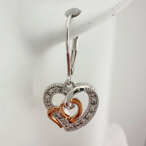 Two Tone Interlocking Hearts Diamond Accent Earrings - Picture 3 of 8